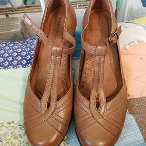 NWOT Brown T-strap shoes with lower heels.